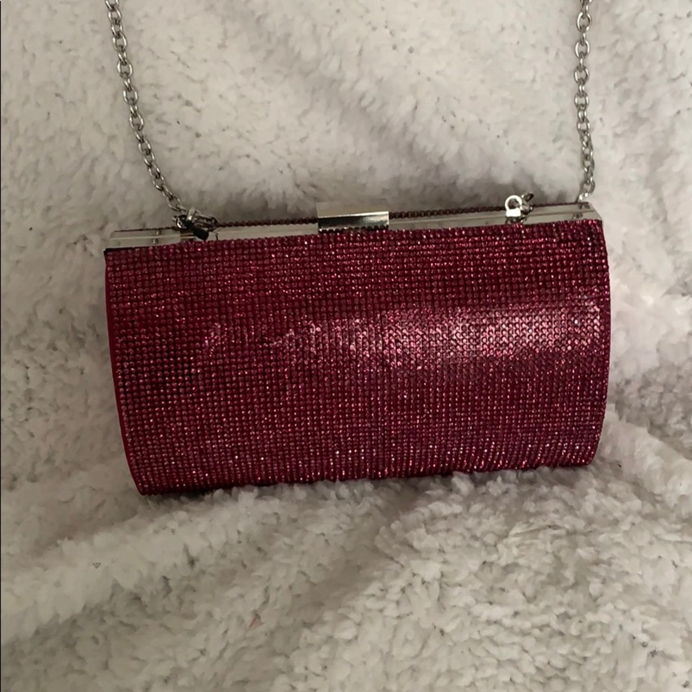 Ranndi Pink hard case clutch with pink crystals